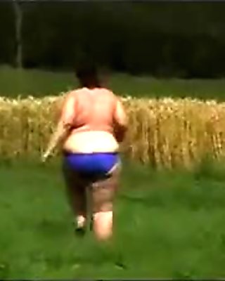 fat playing in field