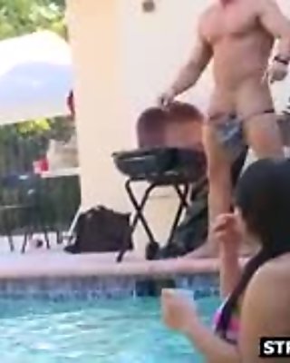 Male stripper heating up the pool