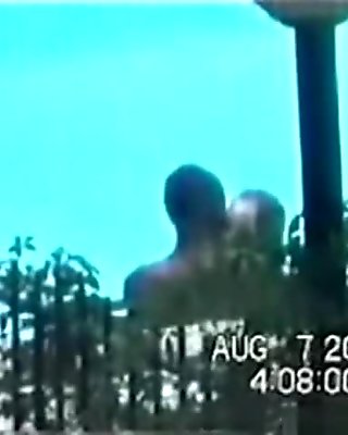 Voyeur tapes a latina couple having sex near the swimming pool