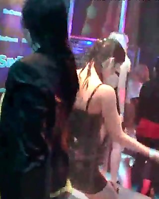 Sexy bitches dancing erotically in a club
