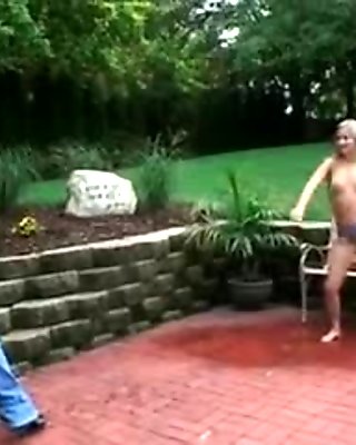 Lovely teen blonde gets sprayed outdoors